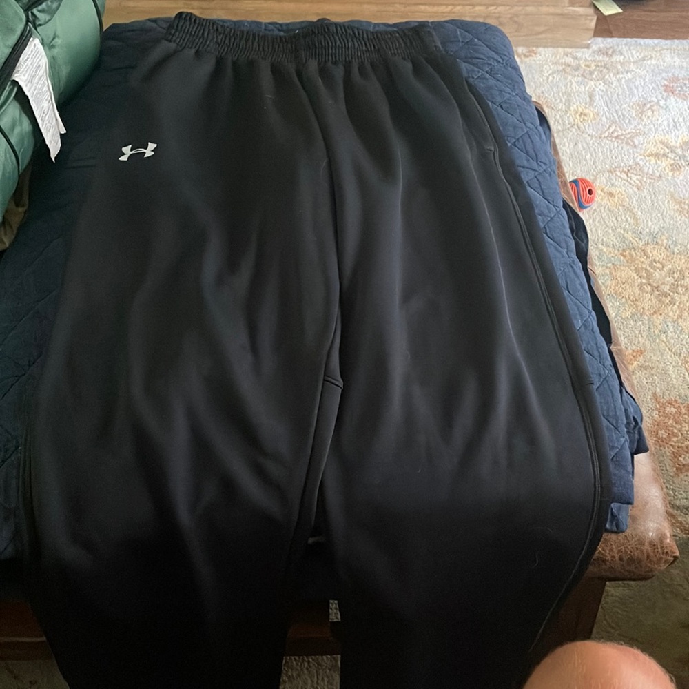Black under armor sweat pants.